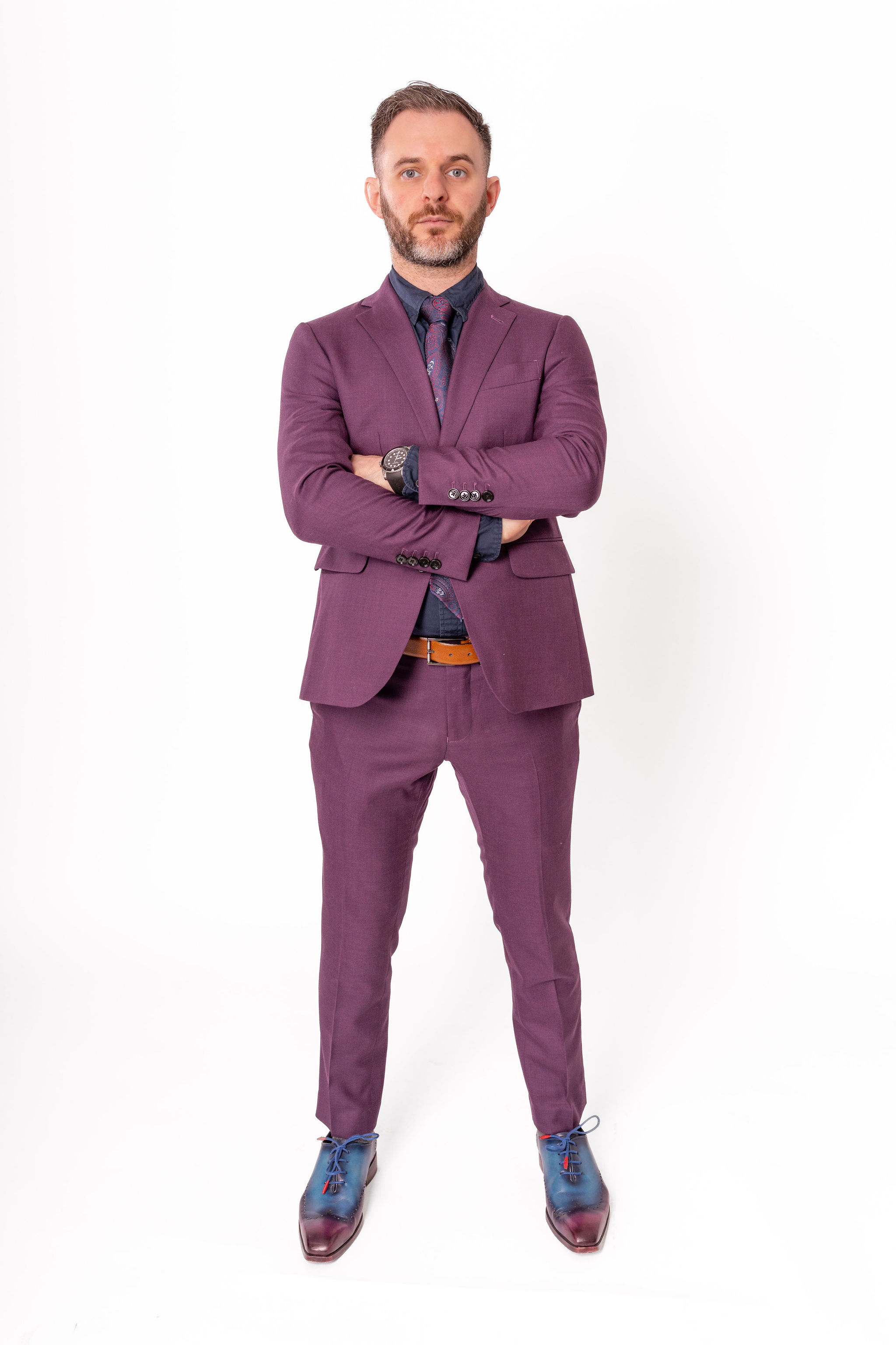 Dr. Stacey Podkovik in his purple suit.
