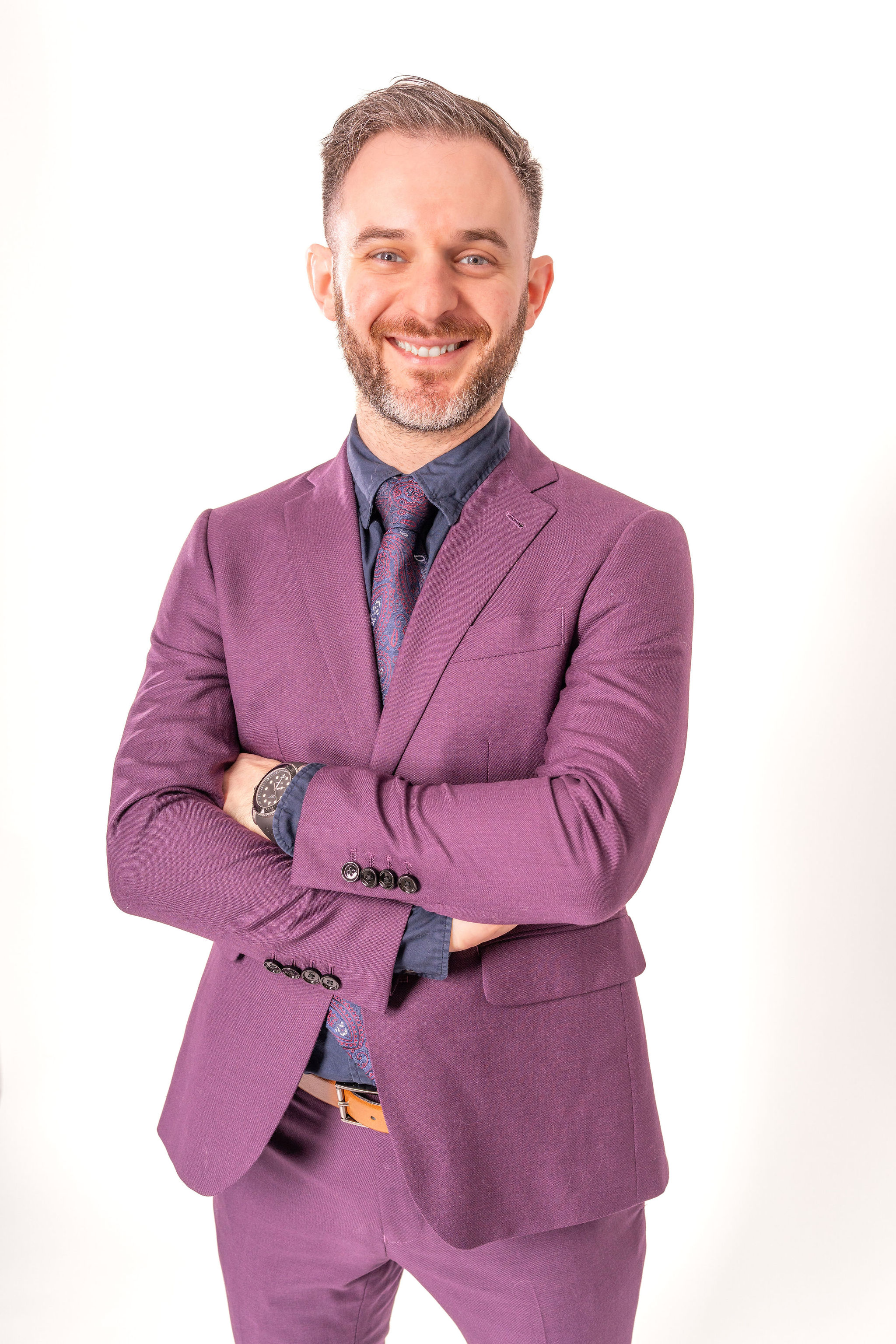 Dr. Stacey Podkovik in his purple suit.